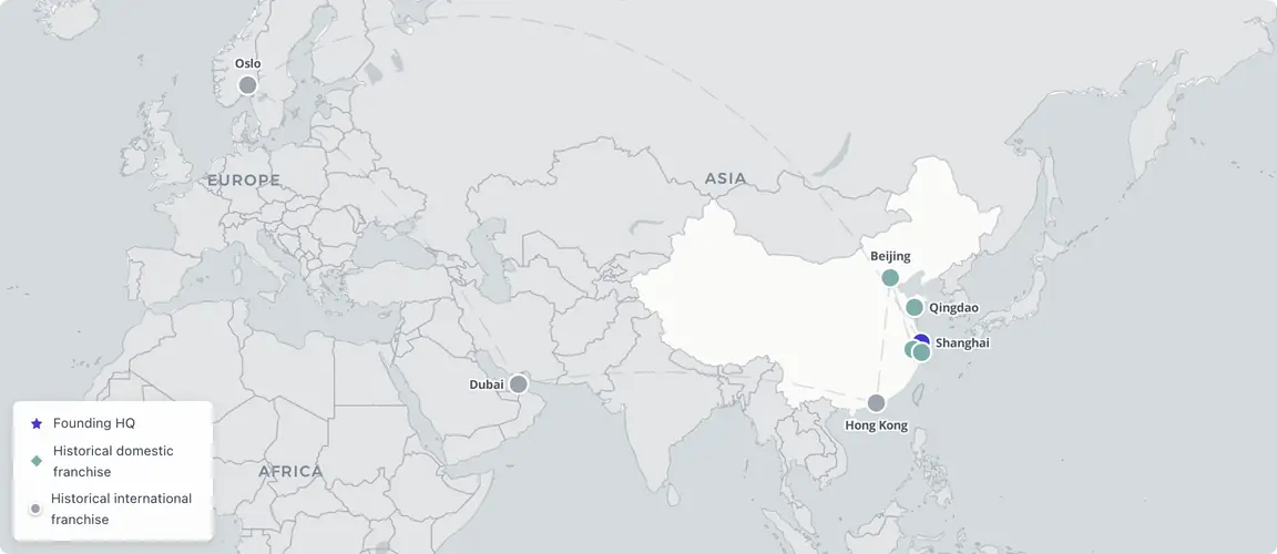 Shanghai 2003 founding + three historical international franchises (Oslo 2006, Dubai 2008, Hong Kong 2010) — the export experiment proved a Chinese service brand could transfer Academy-trained quality across cultures.